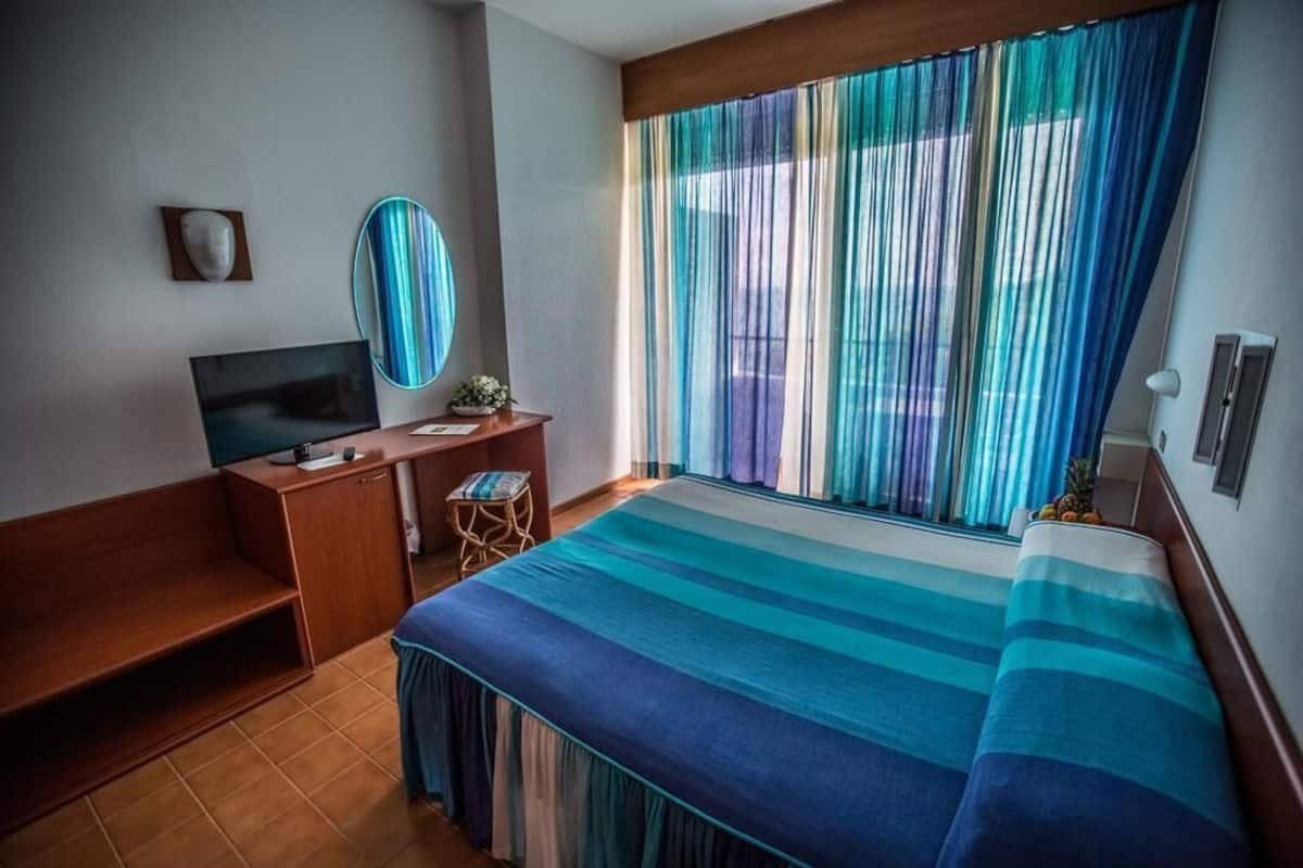 Standard Triple Room, Garden View | Minibar, in-room safe, desk, cribs (free)