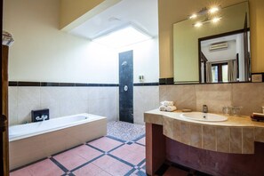 A modern bathroom with a bathtub, a sink, and a shower. - PB - 7BR - V5 & V1 7BR Private Pool Villa, Walk to Seminyak Beach (Seminyak)