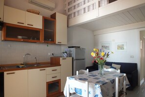 Fridge, oven, stovetop, high chair