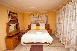 Standard Double Room | Down comforters, desk, laptop workspace, free WiFi - Mck Lodge Ltd (Lusaka)