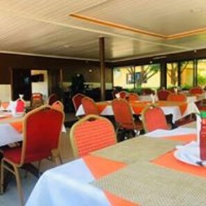 Breakfast, lunch, dinner served; local cuisine 