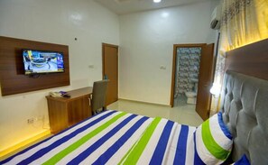 Separate bathtub and shower, deep-soaking bathtub, towels