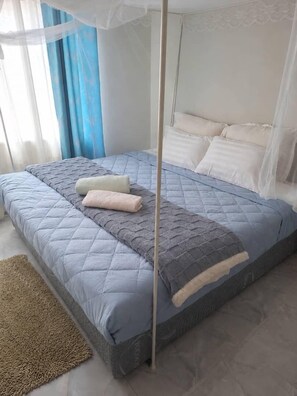 Deluxe Double or Twin Room | Down comforters, desk, laptop workspace, blackout drapes
