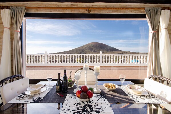 Outdoor dining - Holiday Home "Villa Clara 3" with Large Pool, Stunning View, Terrace and Garden (Lanzarote)