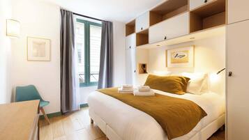 4 habitaciones, tabla de planchar con plancha, cuna de viaje y wifi