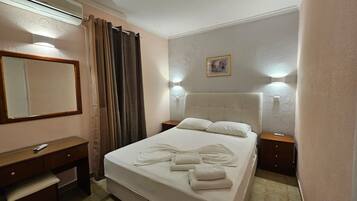 Apartment, 1 Bedroom, Smoking, Balcony | 1 bedroom, iron/ironing board, bed sheets