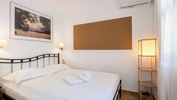 Apartment, 1 Bedroom, Smoking, Garden View | 2 bedrooms, iron/ironing board, bed sheets