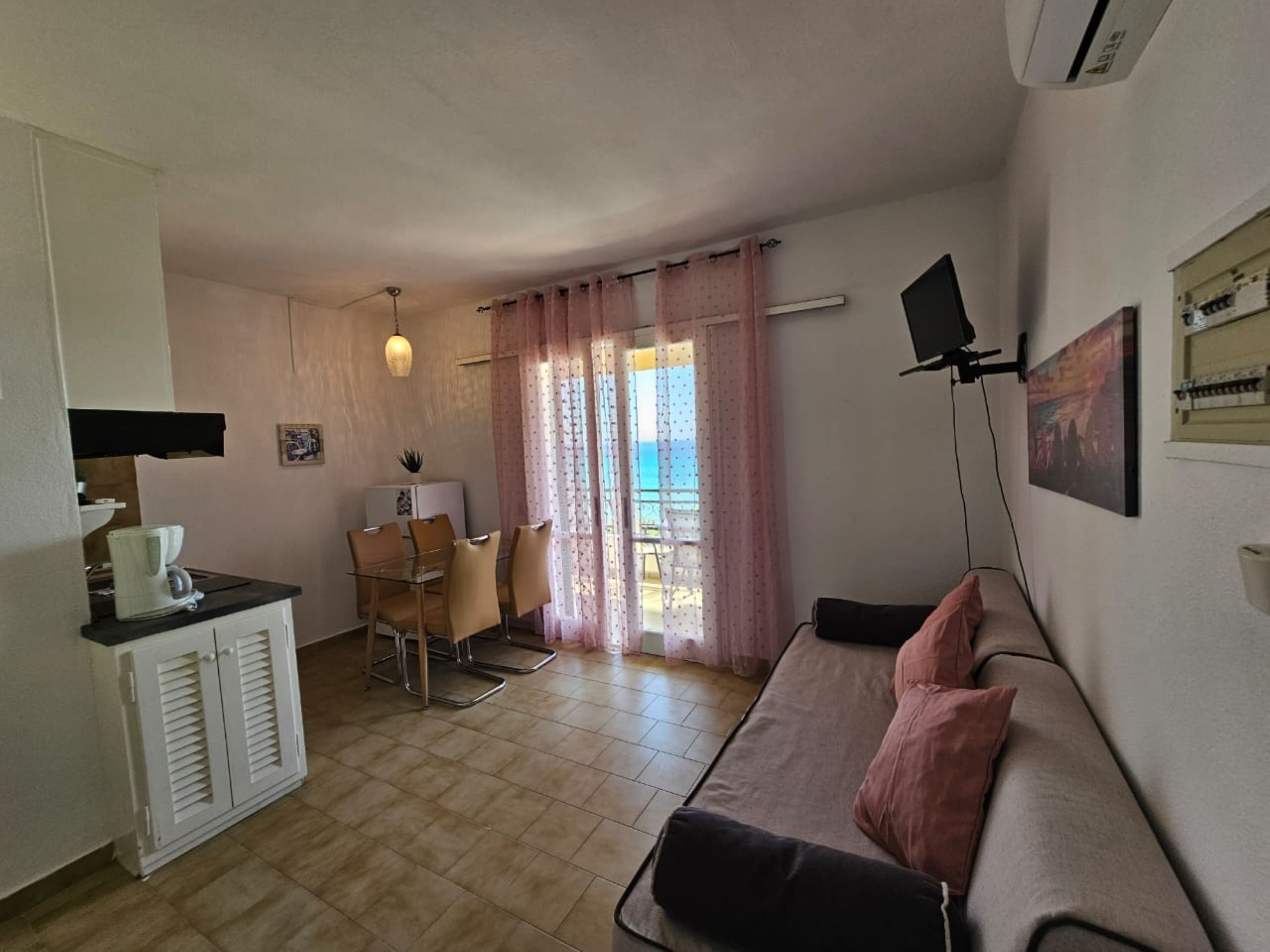 Apartment, 1 Bedroom, Smoking, Balcony | Living area | TV