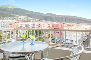 Outdoor dining - Superior Beachfront Apartment with Pool, Balcony, Sea Views & Wi-Fi; Parking Available (Candelaria)