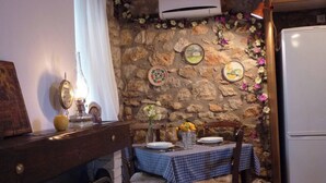 Studio, 1 Bedroom, Balcony, Garden View | Dining - Big Blue All Stone Traditional House (East Mani)