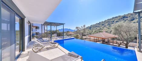 Seasonal outdoor pool, sun loungers