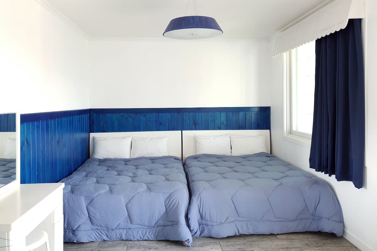 Condo, 2 Double Beds (Hyacinth) | WiFi (free), individually decorated