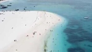 A beach with clear turquoise waters and a sandy shore. - Tropicana Kendwa Beach Hotel (Kendwa)
