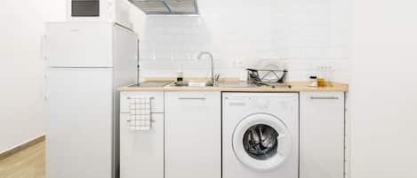 Fridge, microwave, stovetop, coffee/tea maker