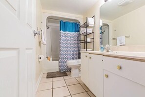 Bathtub, towels, shampoo