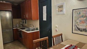 Apartment, 1 Bedroom, Smoking, Garden View | Private kitchen | Fridge, microwave, electric kettle, highchair