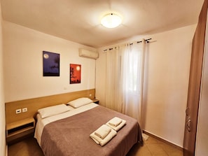 Apartment, 1 Bedroom, Garden View | 2 bedrooms, iron/ironing board, bed sheets - Corfu Glyfada Menigos Resort 22 (Corfu)