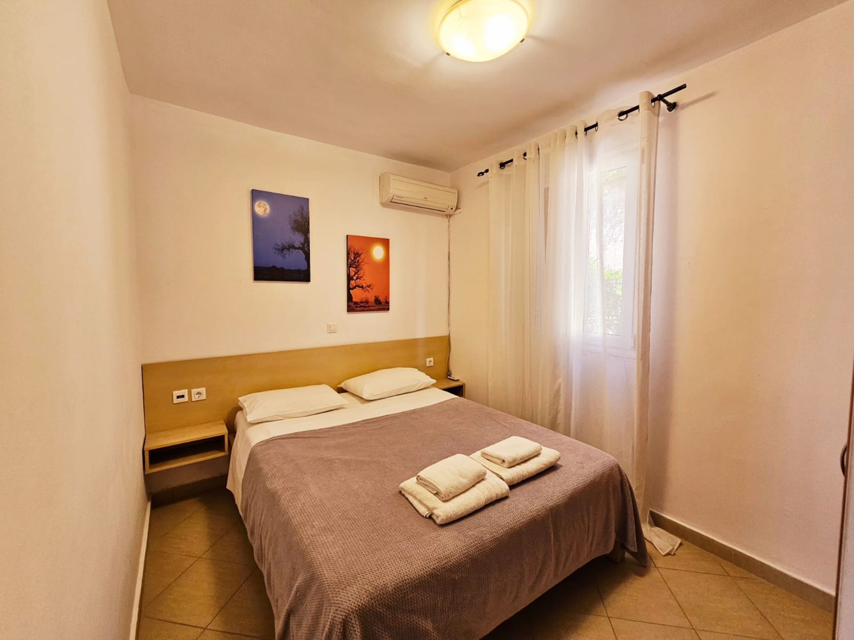 Apartment, 1 Bedroom, Garden View | 2 bedrooms, iron/ironing board, bed sheets