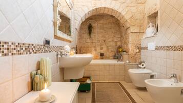 Bathtub, hair dryer, towels