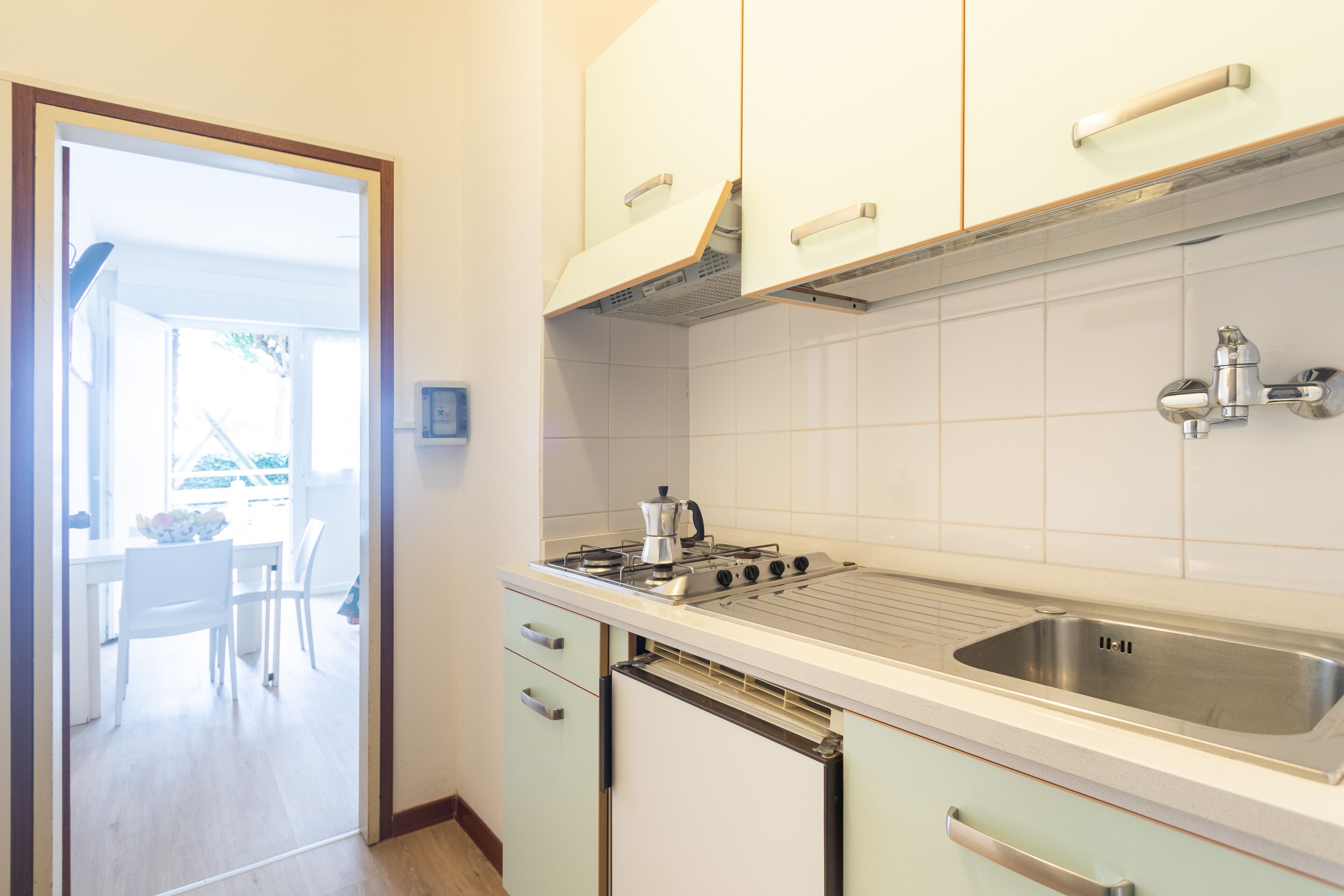 Fridge, stovetop, cookware/dishes/utensils