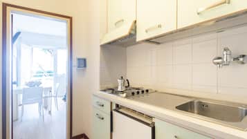 Fridge, stovetop, cookware/dishes/utensils
