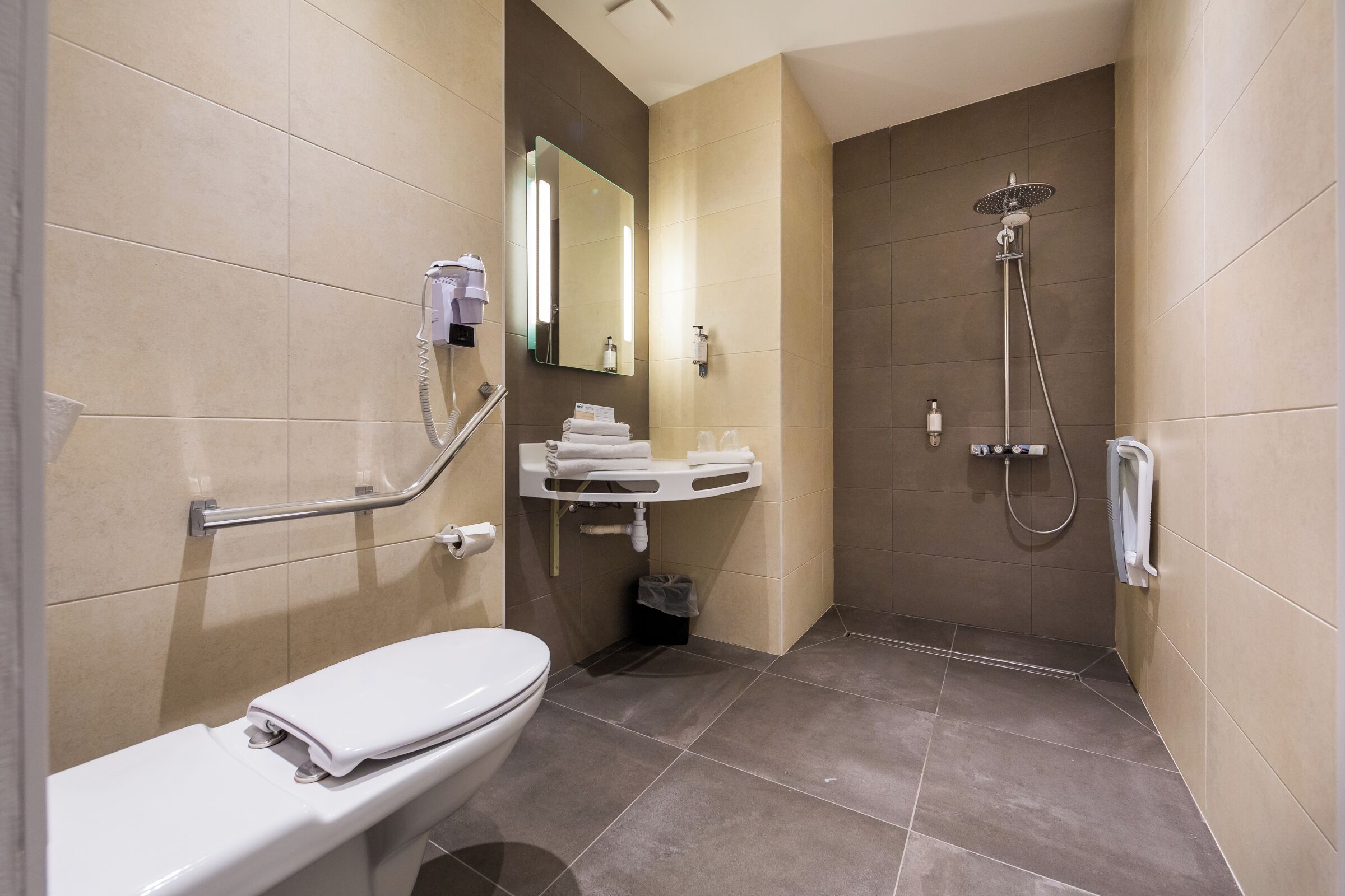 superior double room | bathroom | shower, free toiletries, hair dryer, towels