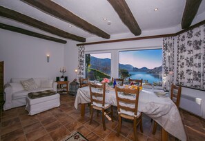 Family Villa, 2 Bedrooms, 2 Bathrooms (Morcote Magic View) | Living area | 22-inch flat-screen TV with digital channels, TV, fireplace