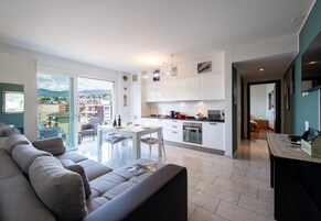 Family Apartment, Multiple Bedrooms (Panoramic Penthouse) | Living area | 22-inch flat-screen TV with digital channels, TV