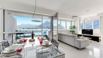 Family Apartment, 2 Bedrooms, 2 Bathrooms (Paradiso Incanto) | Living area | 22-inch flat-screen TV with satellite channels, TV, DVD player