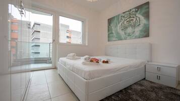 Family Apartment, 1 Bedroom (Prestige du Lac 27) | Iron/ironing board, bed sheets