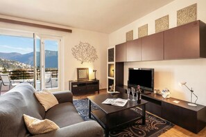 Apartemen Keluarga, beberapa kamar (Santiago Home) | Area keluarga | Televisi layar datar 22-inci dengan saluran TV digital dan TV