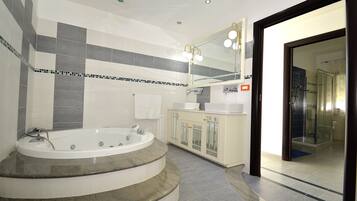 Bathtub, hair dryer, towels