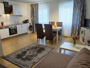 Apartment, Garden View | Private kitchen | Fridge, oven, stovetop, coffee/tea maker