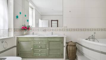 Bathtub, hair dryer, towels
