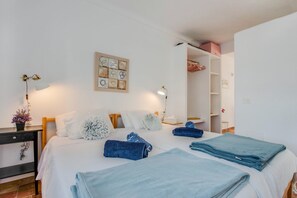 1 habitación, tabla de planchar con plancha, wifi gratis y ropa de cama 