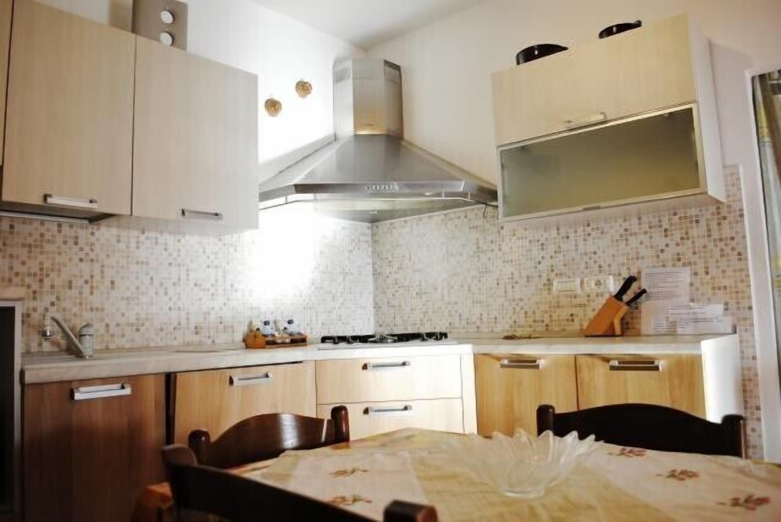 Fridge, stovetop, dishwasher, highchair