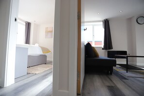 Deluxe Apartment | Living area | 50-inch flat-screen TV with cable channels, TV - NEC Airport Shortstay (Birmingham)