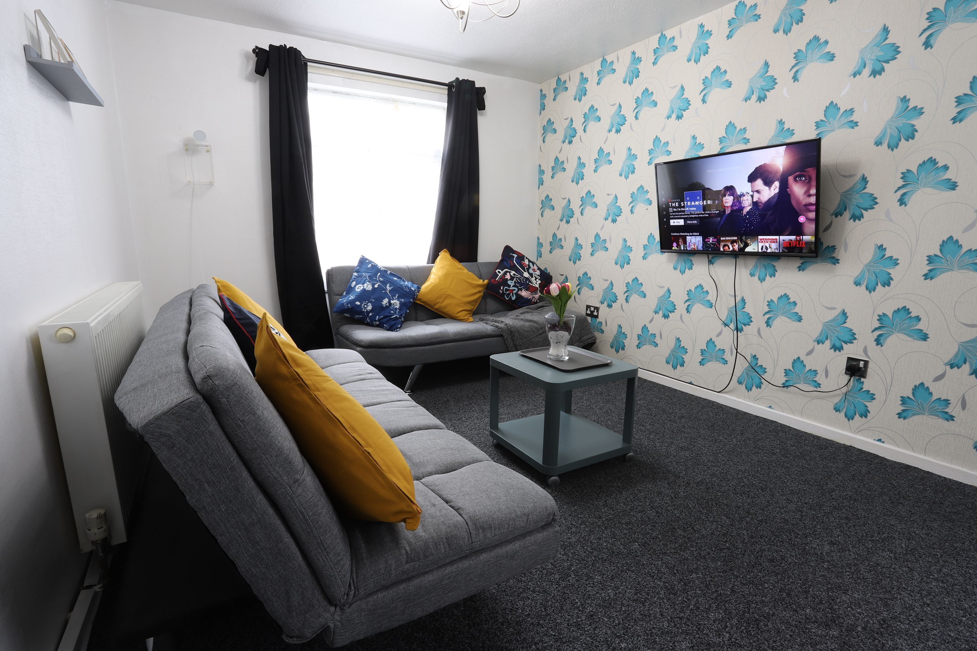 32-inch flat-screen TV with cable channels, TV