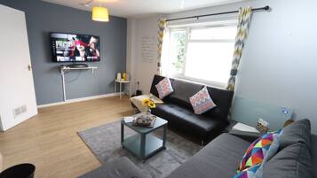 32-inch flat-screen TV with digital channels, TV