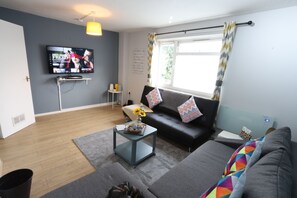 32-inch flat-screen TV with digital channels, TV