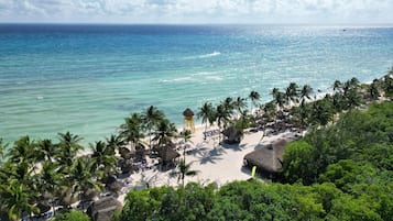 On the beach, white sand, free beach shuttle, free beach cabanas