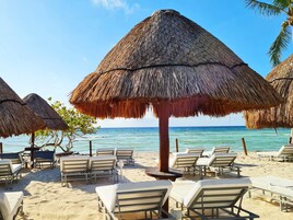 Beach nearby, white sand, free beach shuttle, free beach cabanas