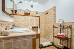 Bathtub, hair dryer, towels