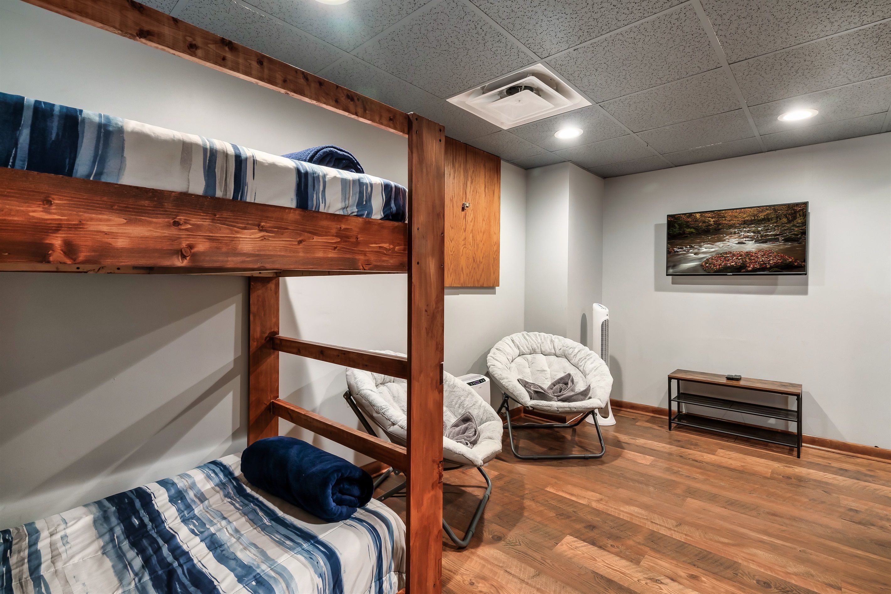 TV and seating area in bunkroom