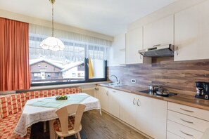 Fridge, stovetop, dishwasher, electric kettle