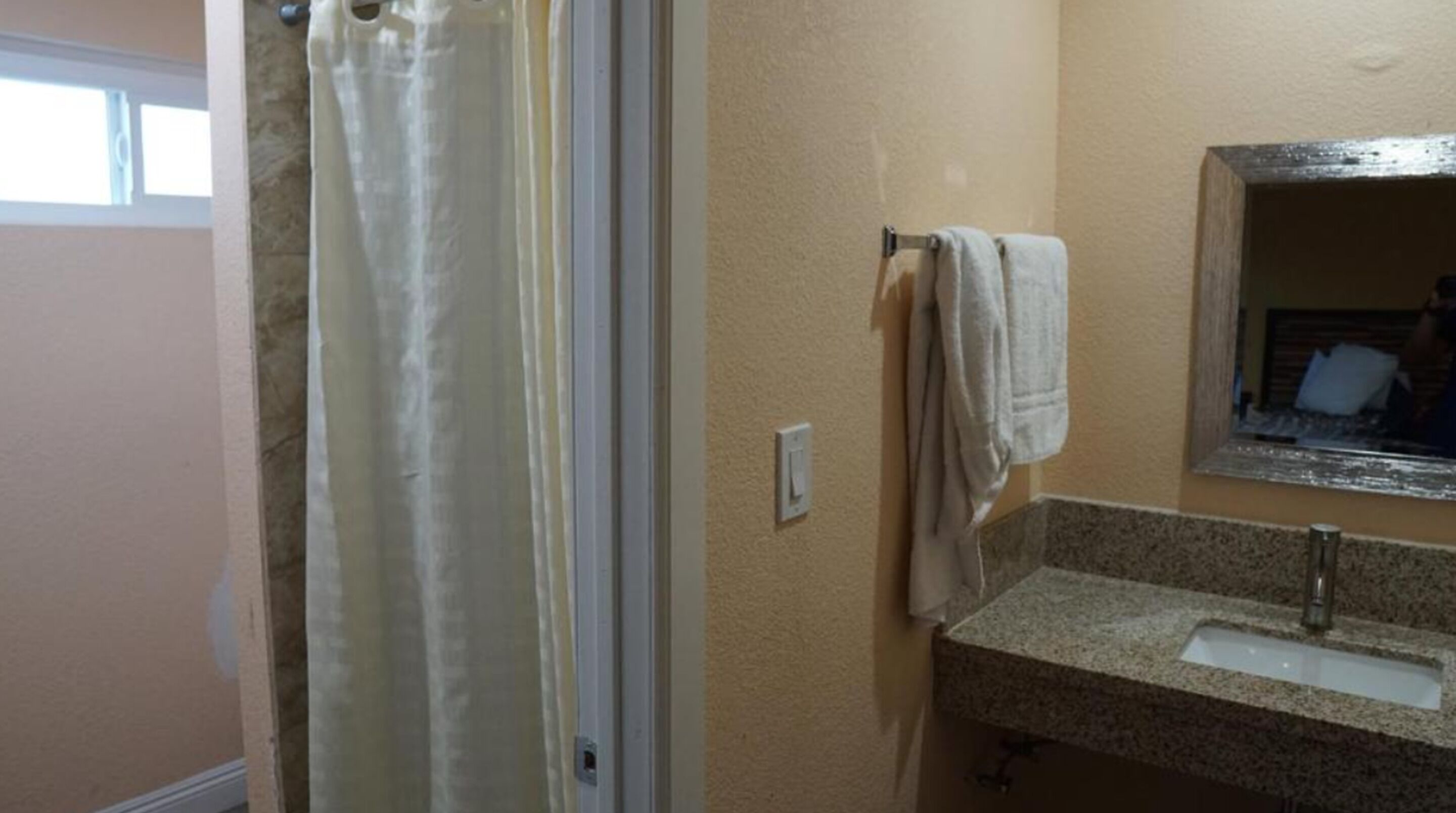 Hair dryer, slippers, towels