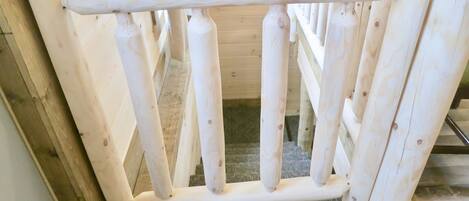 A wooden interior with a simple, rustic design.