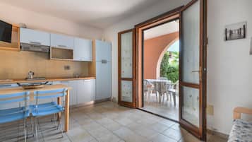 Fridge, stovetop, cookware/dishes/utensils