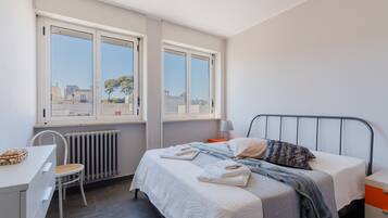 2 chambres, fer et planche à repasser, Wi-Fi, draps fournis