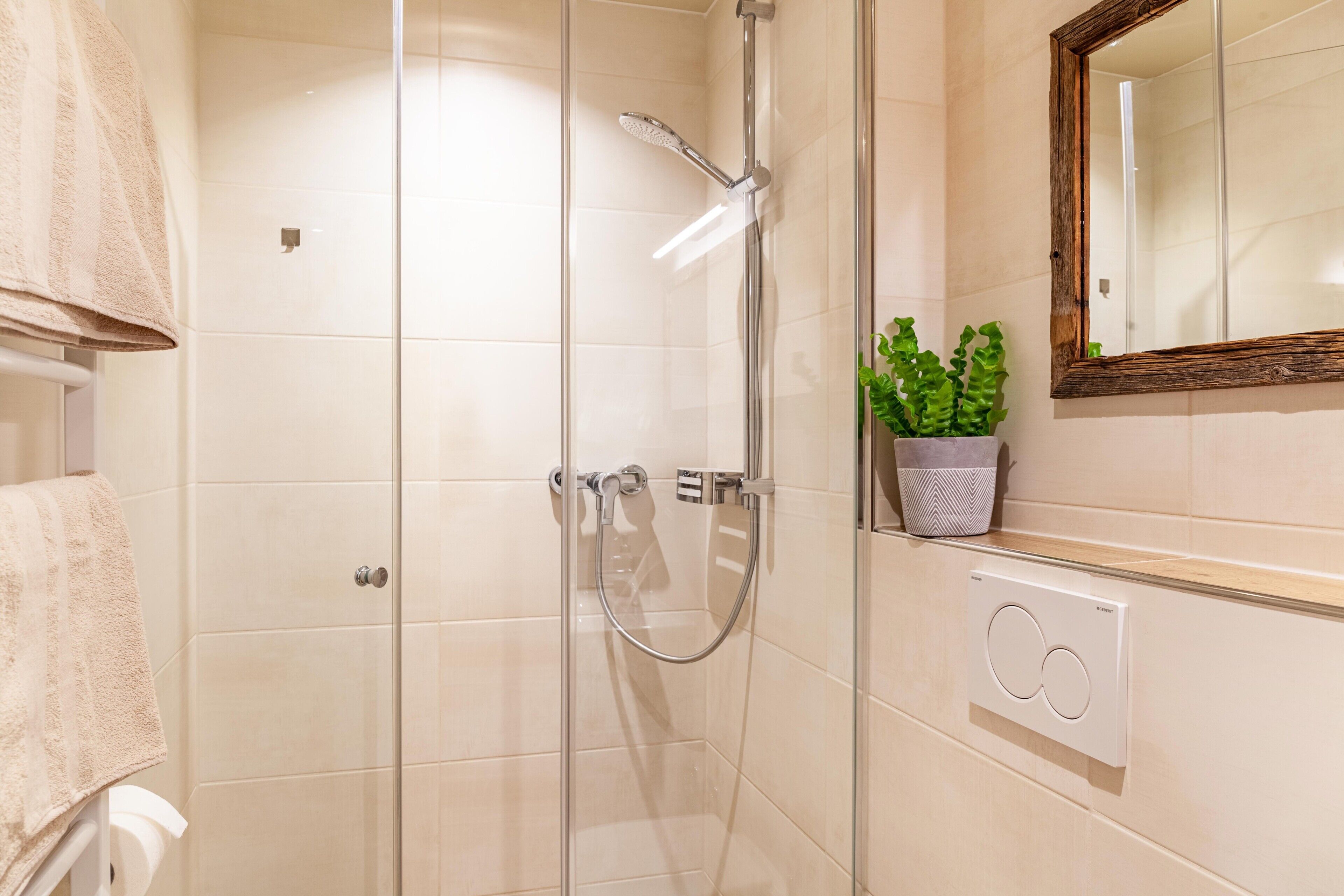 Shower, free toiletries, hair dryer, towels